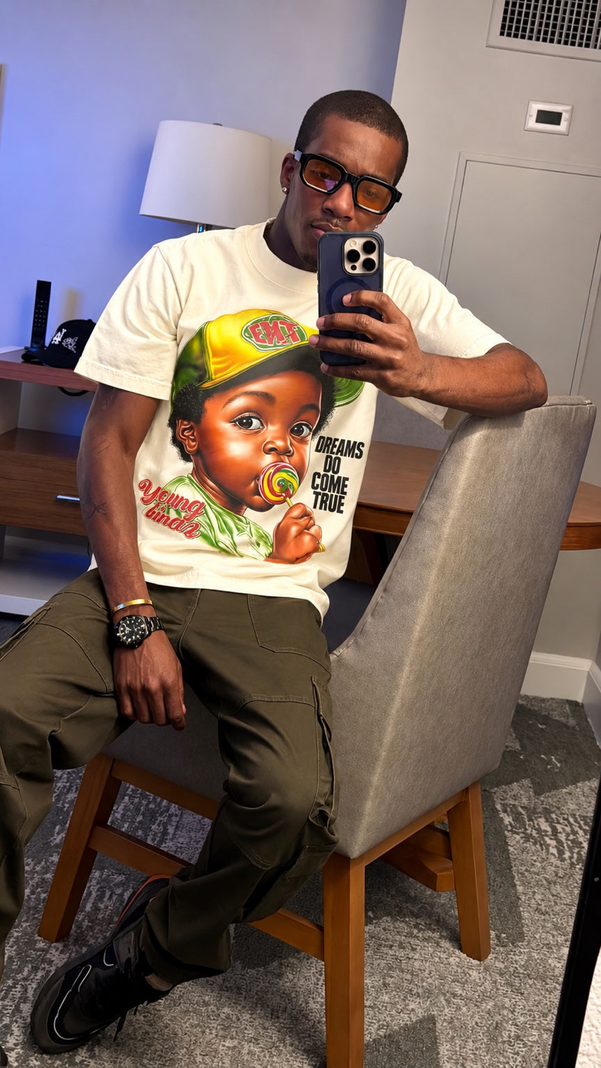 Customer wearing ExitTheTrap Dreams Do Come True tee